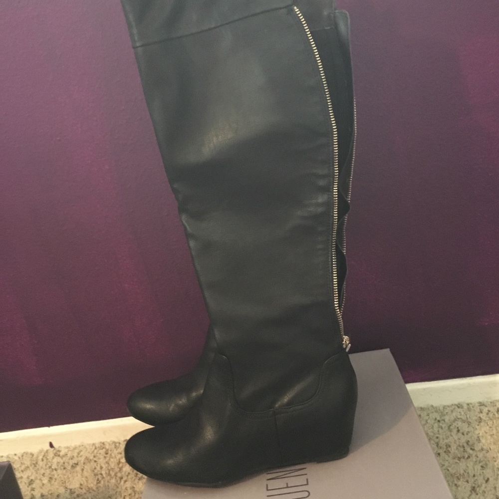 Black wedge boots